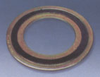 Spiral wound gasket with outer and inner ring